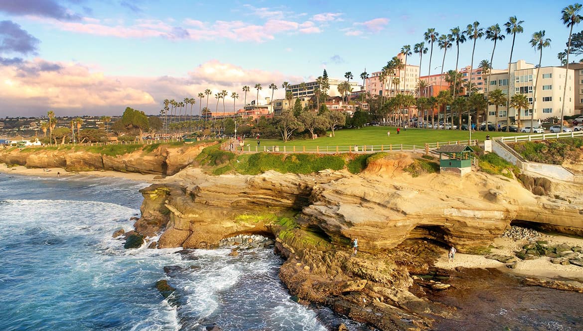 a scenic view of the ocean and a beach.